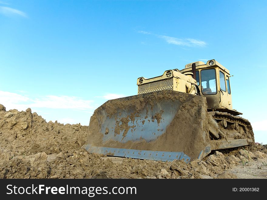 Digger, Heavy Duty construction equipment parked at work site