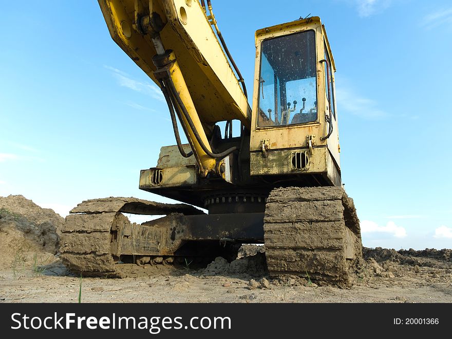 Digger, Heavy Duty construction equipment parked at work site