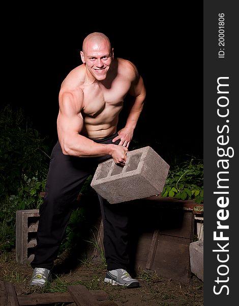 Pumped white guy posing in the backyard. Pumped white guy posing in the backyard