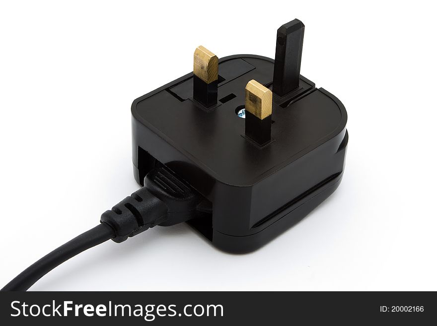 Black UK plug isolated on white. Black UK plug isolated on white