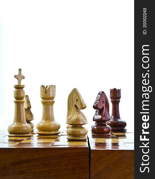 Wooden chess on white background. Wooden chess on white background