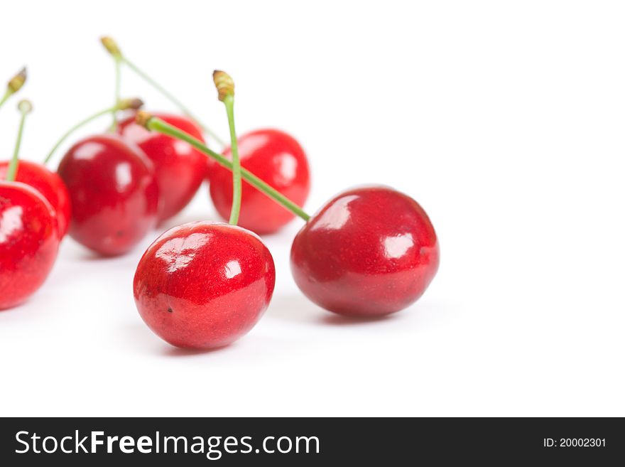 Red ripe cherries isolated on a white background