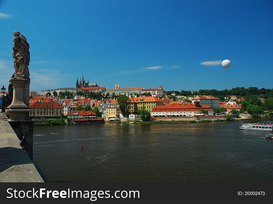 View of the Mala Strana, castle quarter and the Vtlava river in Prague, seen from the Carl's bridge. View of the Mala Strana, castle quarter and the Vtlava river in Prague, seen from the Carl's bridge.
