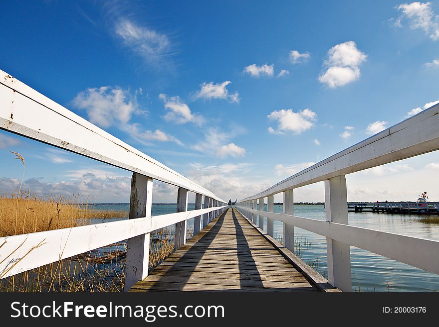 A pier with blue sky in Germany.