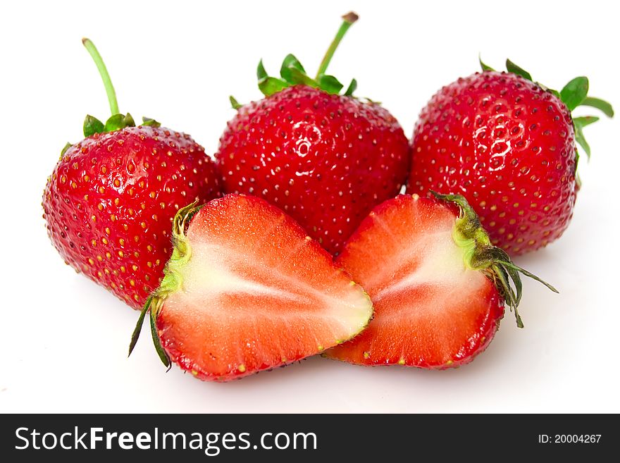 Beautiful strawberries isolated on white. Beautiful strawberries isolated on white