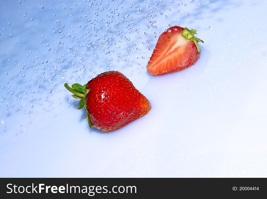 Strawberry In Water Splash