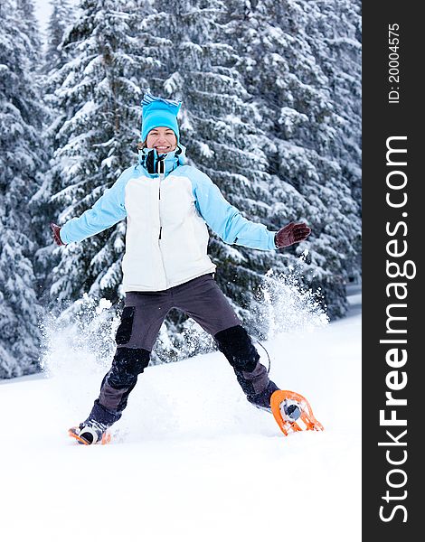 Hiker girl jumps in snow. Hiker girl jumps in snow