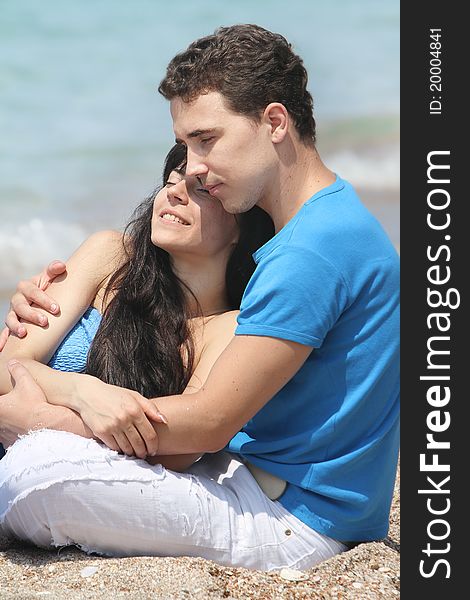 Young loving couple on natural background. Young loving couple on natural background