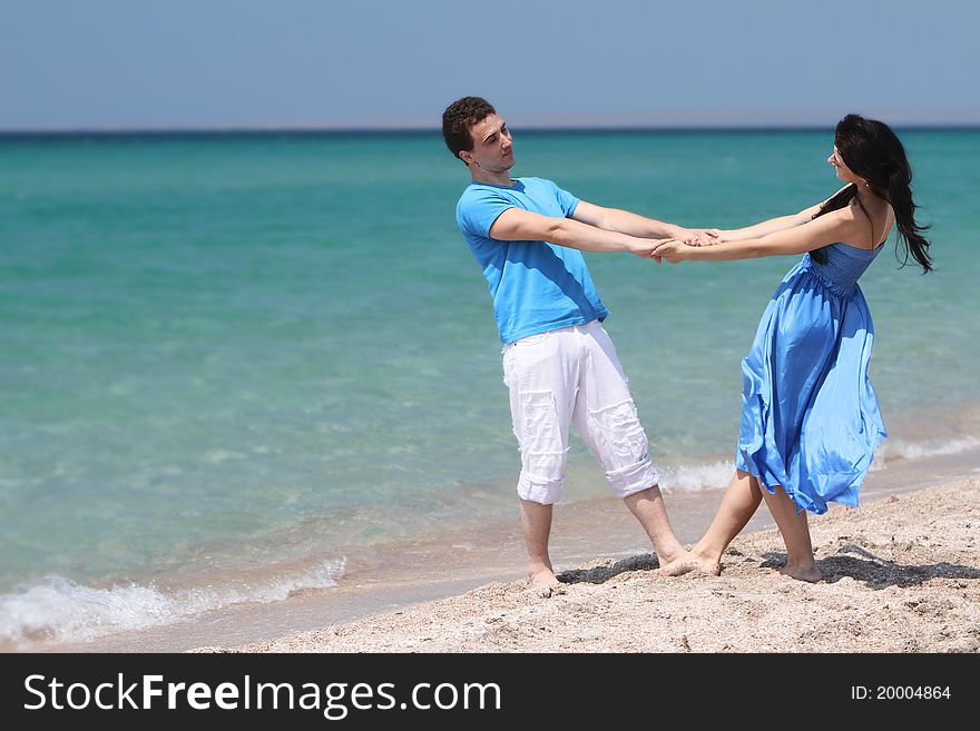 Young Couple On Natural Background