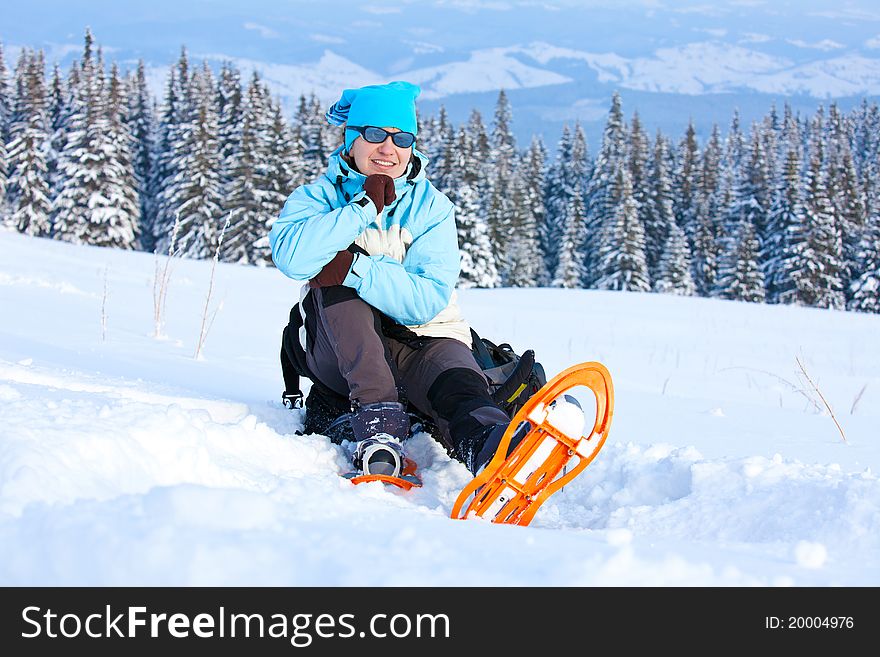 Hiker took a rest in snow forest. Hiker took a rest in snow forest