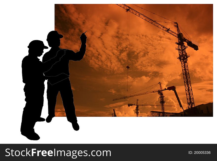 Silhouette of construction man on sunset