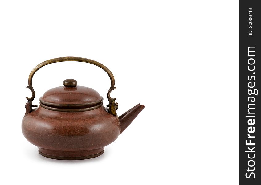 Old teapot isolated on the white background