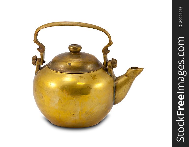 Old gold teapot isolated on the white background