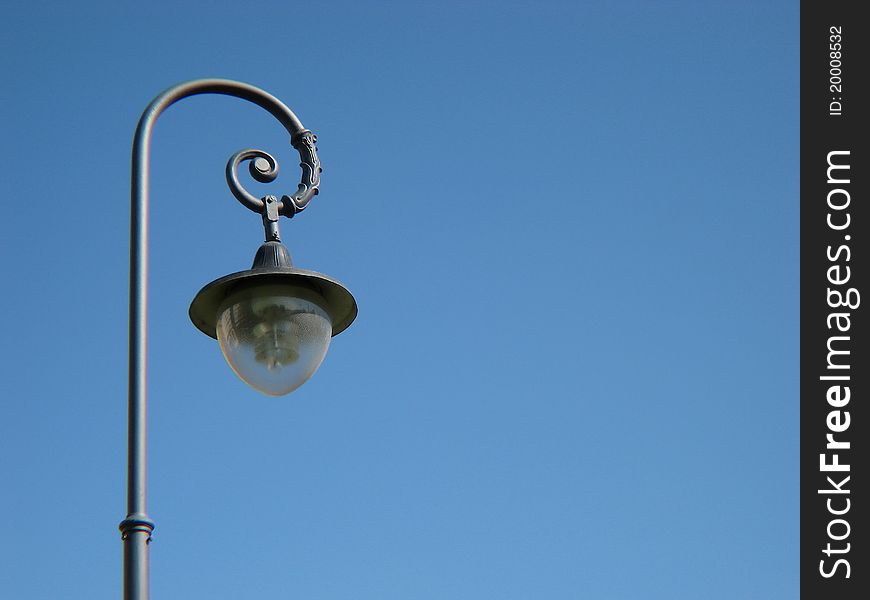 Street Lantern Against The Blue Sky Without Clouds