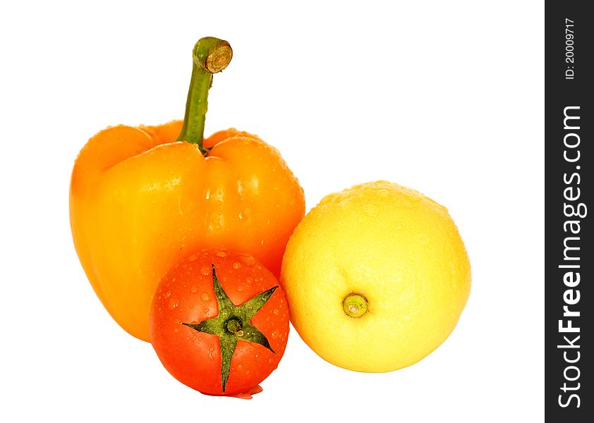 Pepper,tomatoe and lemon isolated on a white background. Pepper,tomatoe and lemon isolated on a white background