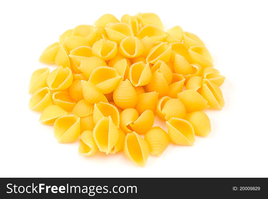 Uncooked pasta rigate isolated on white