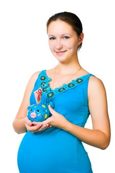 Pregnant Woman Holding  Piggy Bank Royalty Free Stock Photography