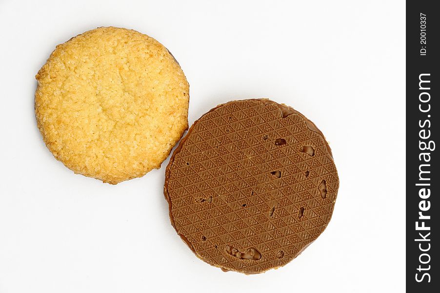 Biscuits covered with milk chocolate on one side - isolated on white