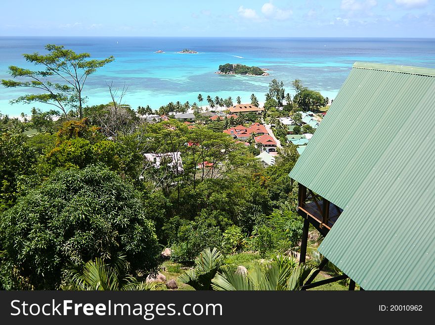 Green Roofs over the Seychelles beach of Cote d'or in Praslin island. Green Roofs over the Seychelles beach of Cote d'or in Praslin island