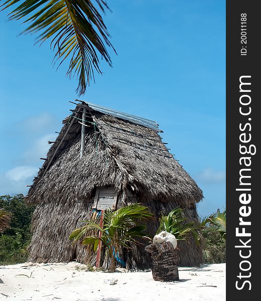 Coconut palm leaves hut on the caribbean beach. Coconut palm leaves hut on the caribbean beach.