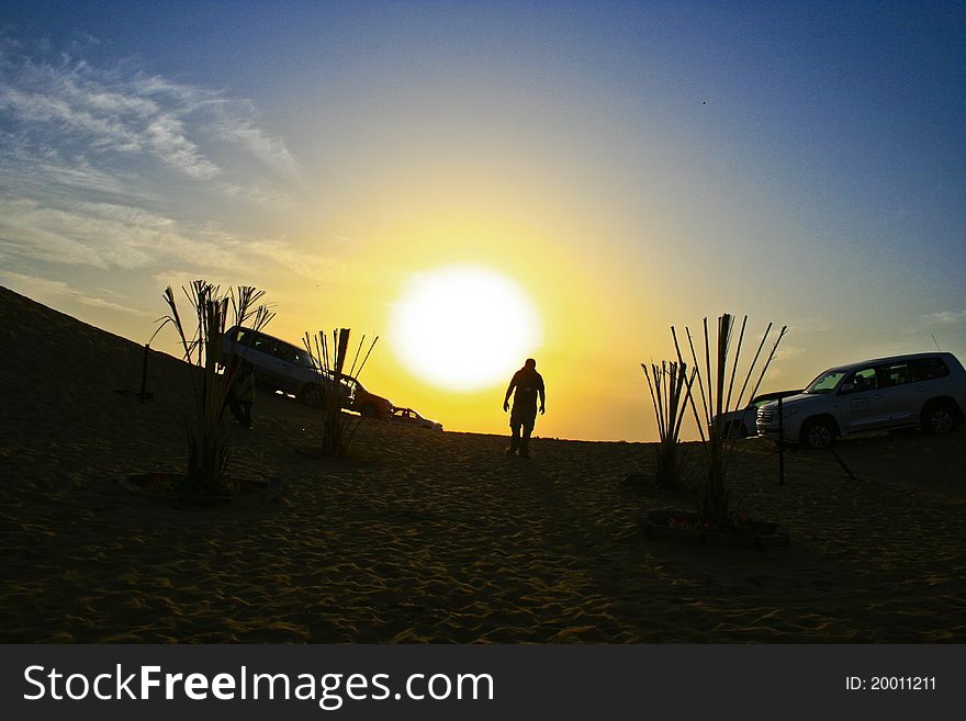 A view of a desert's sunset in Dubai. A view of a desert's sunset in Dubai.