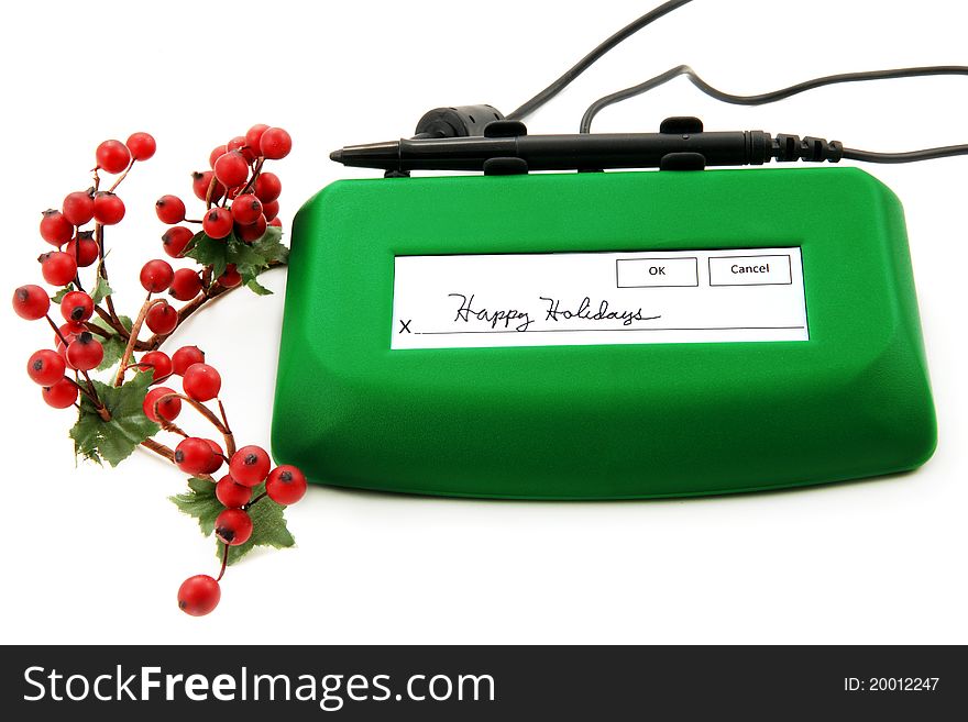 A green signature pad with Happy Holidays hand written on the signature line. Isolated on white. A green signature pad with Happy Holidays hand written on the signature line. Isolated on white.
