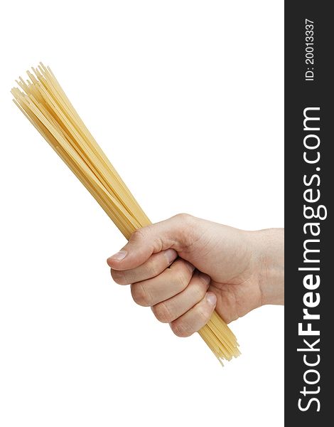 Man's hand holding a handful of spaghetti. isolated on white background