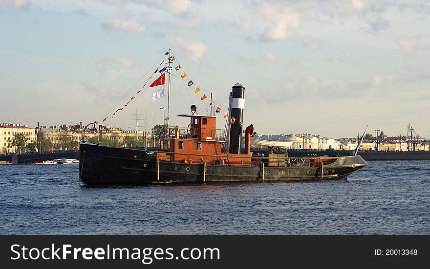 The retro boat moored in the Neva River delta (St Petersburg). The retro boat moored in the Neva River delta (St Petersburg)