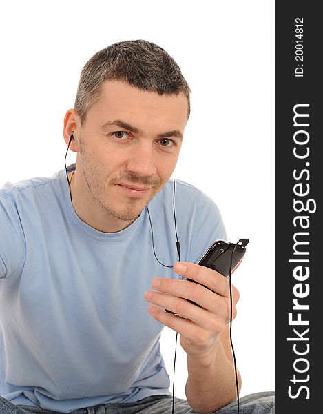 Casual man with cell phone and headphones