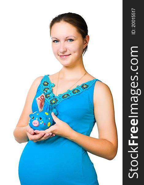 Happy pregnant woman holding piggy bank isolated on white background. Happy pregnant woman holding piggy bank isolated on white background