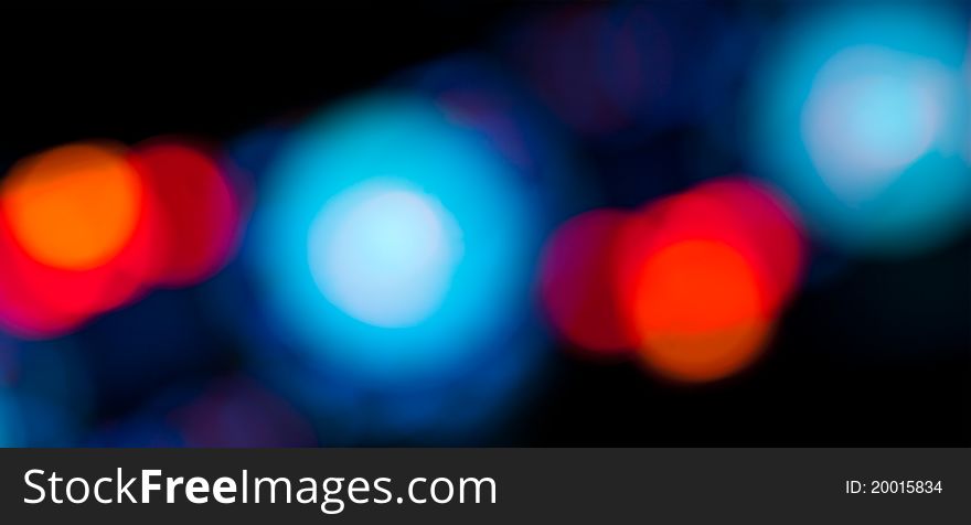 Dark Bokeh Background with red and blue lights