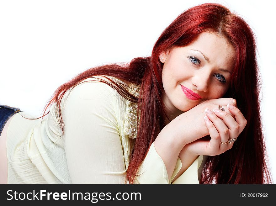 Beautiful smiling woman with red hair isolated on white