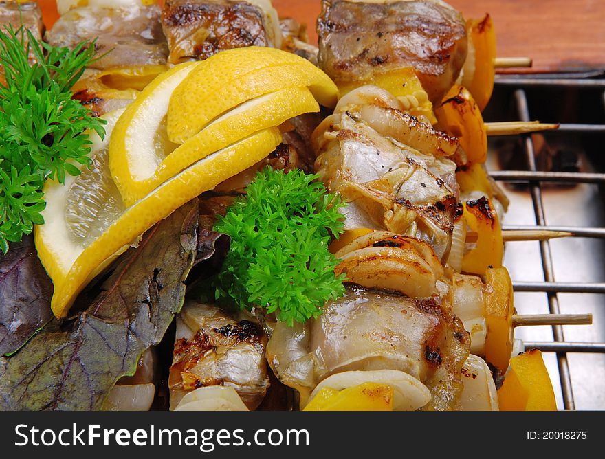 Roasted meat on grill. close-up