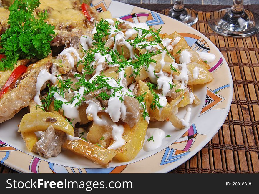 Baked potato with cheese and parsley. Restaurant