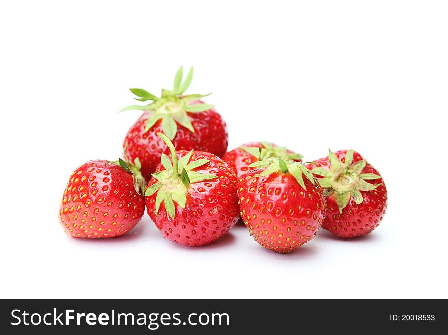 Sweet red strawberries isolated on white background