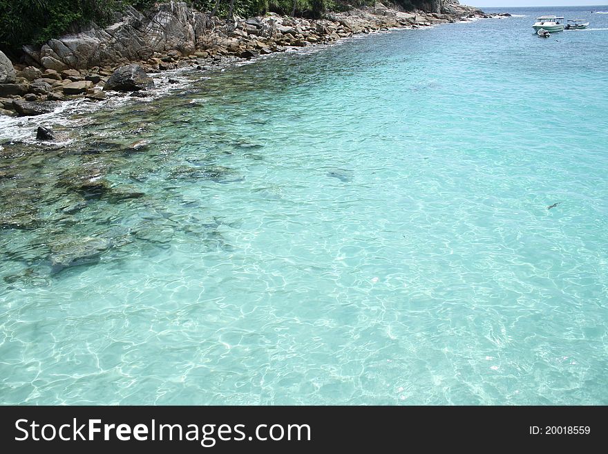 Crystal clear sea water beside the beach