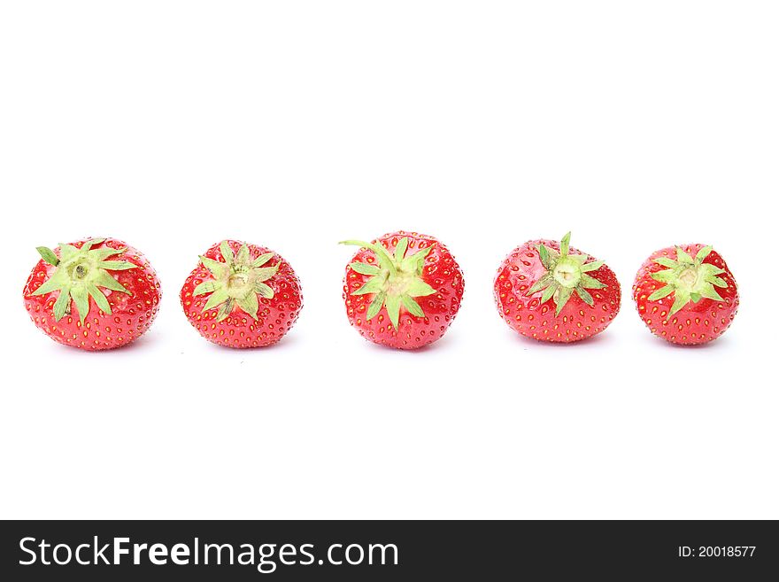 Sweet red strawberries isolated on white background