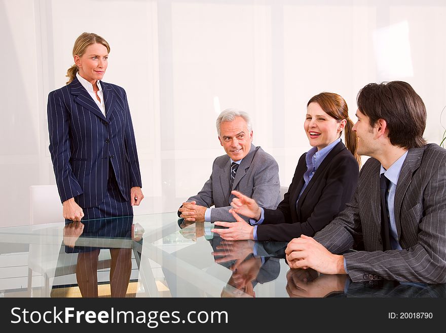 Businessman and businesswoman during a working meeting. Businessman and businesswoman during a working meeting
