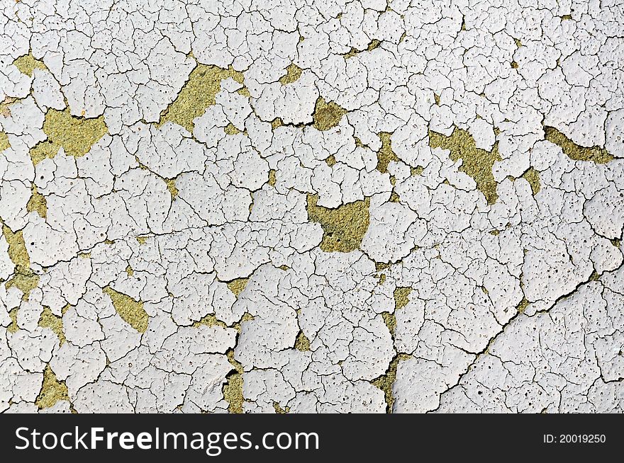 Colorful, textured, wall background with beige, sandstone coloring with cracks. Colorful, textured, wall background with beige, sandstone coloring with cracks