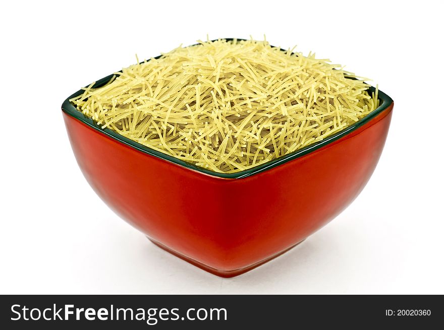 A Red-Black Dish Full of Vermicelli on the White background