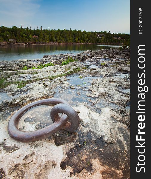 Metal ring for boats to anchor on canadian shield rock