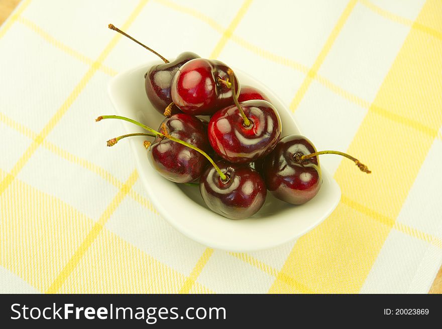 Red cherries in the bowl