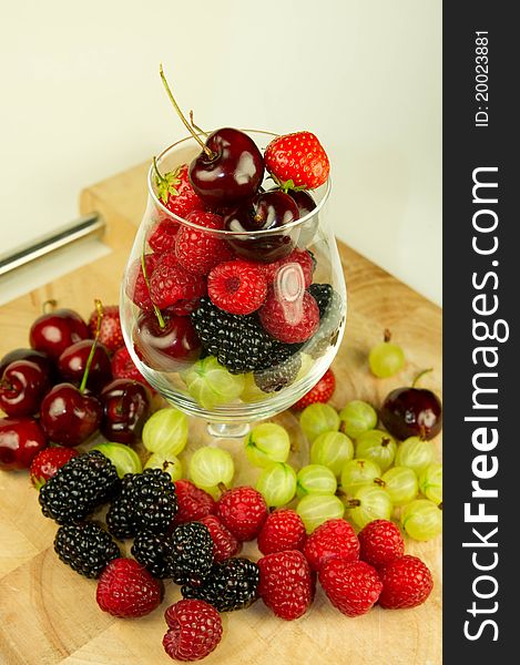 A range of succulent summer berries in a glass. A range of succulent summer berries in a glass