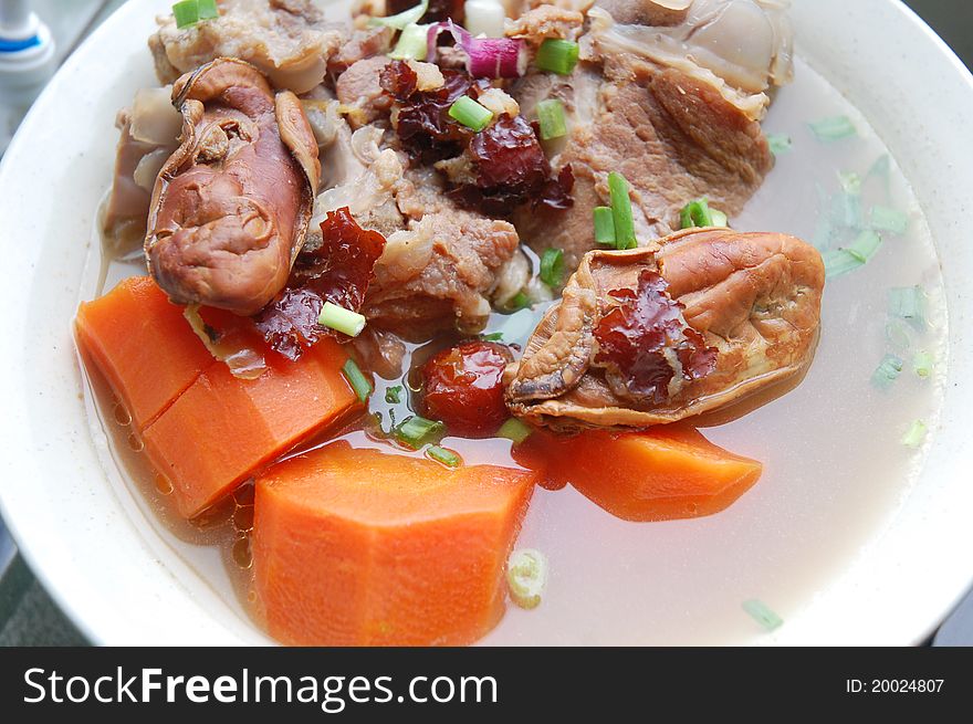 Image of carrot soup with pork meat