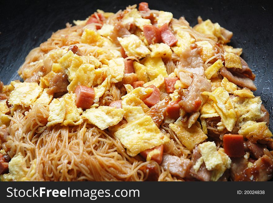 Image of fried rice vermicelli with egg and meat. Image of fried rice vermicelli with egg and meat