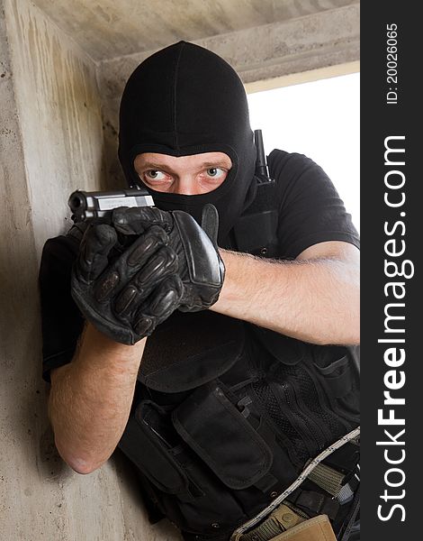 Soldier In Black Mask With 9mm Pistol