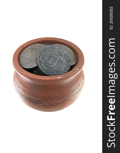 Old traditional clay mug with ancient Russian coins on white background. Old traditional clay mug with ancient Russian coins on white background