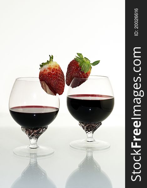 Two goblets with coctails and berries