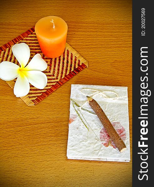 Wood pencil with natural notebook on table