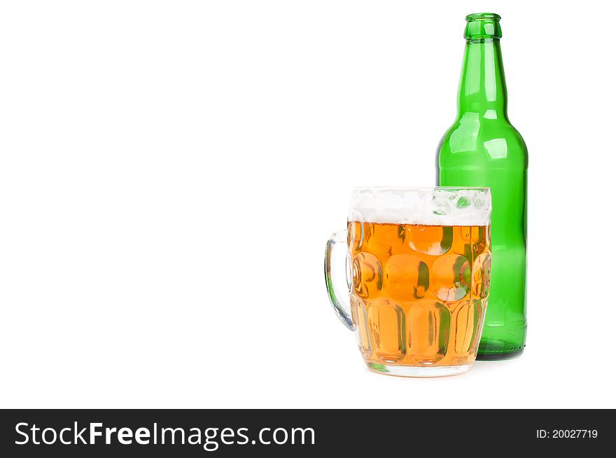 Green bottle and beer isolated on a white background